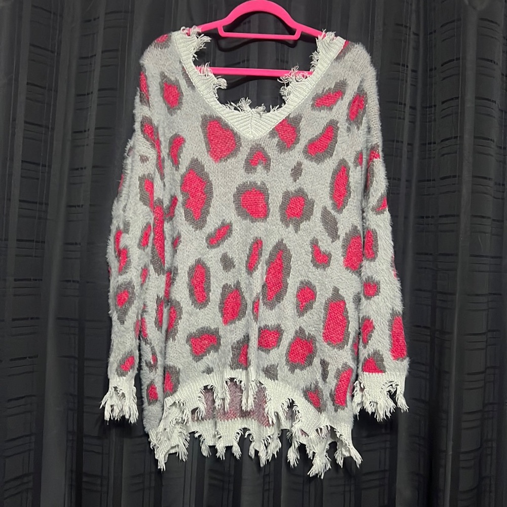 Distressed leopard sweater
